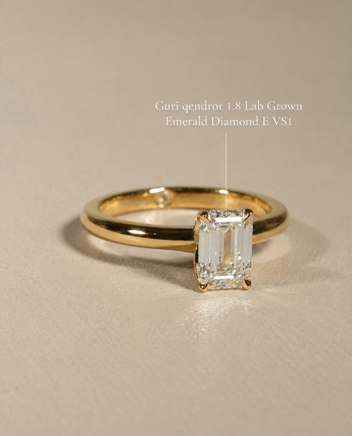 Emerald-cut lab-grown diamond solitaire in yellow gold on a warm sand surface