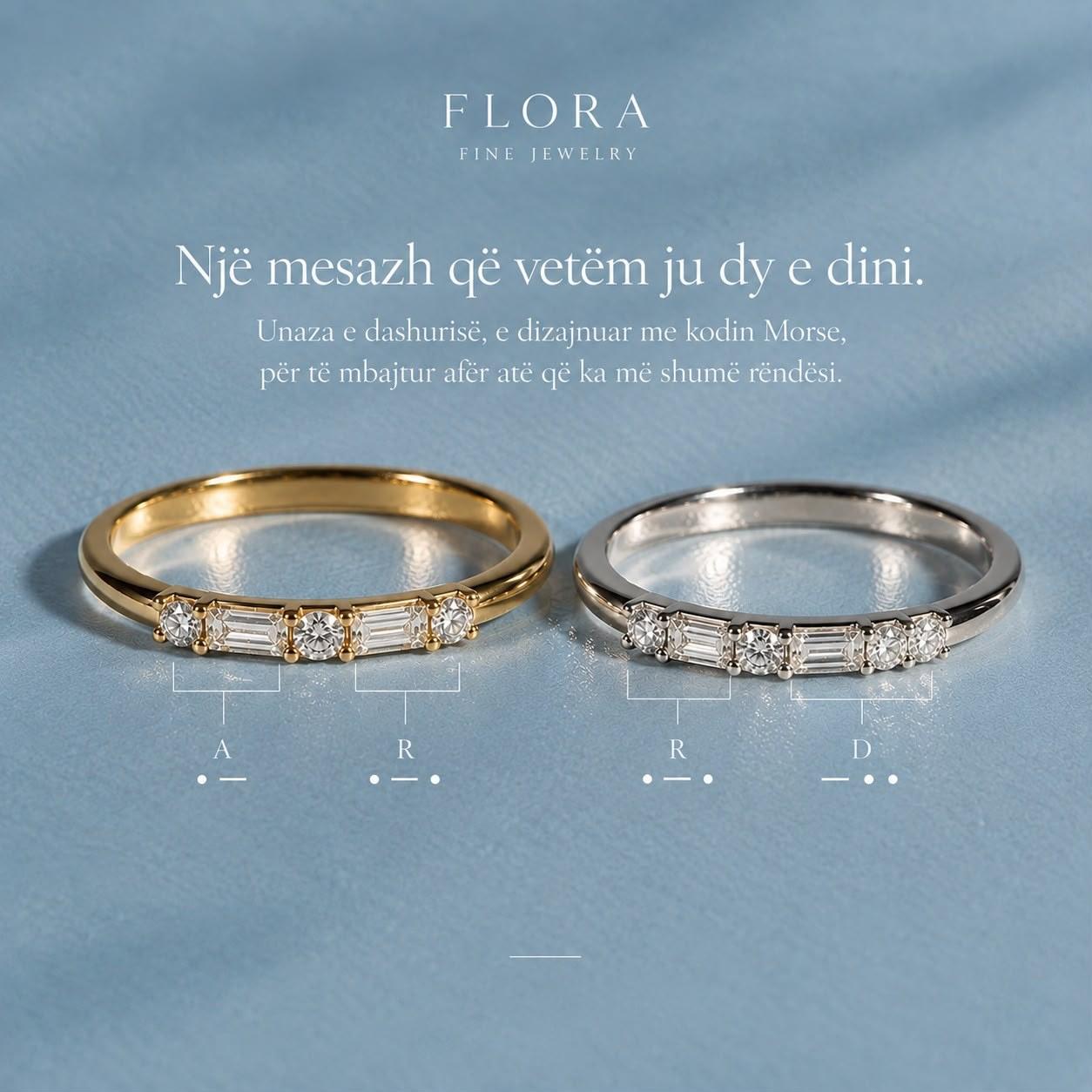 Two FLORA Morse code diamond bands in yellow and white gold, spelling initials in round and baguette diamonds