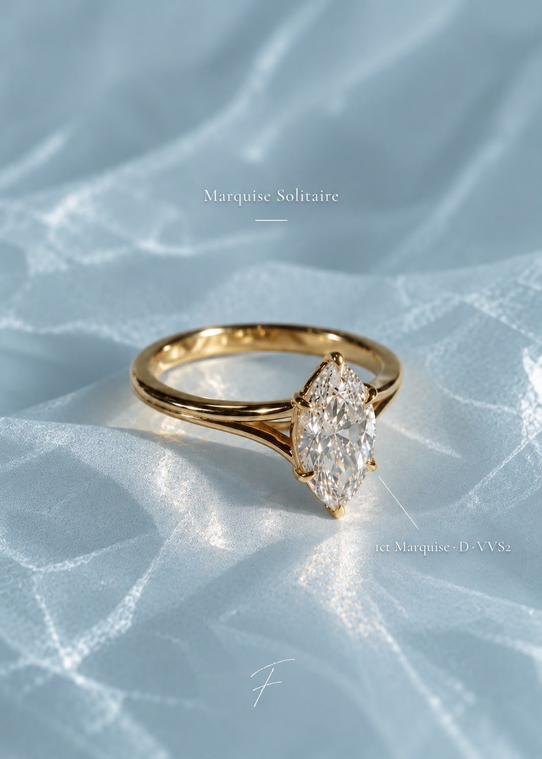 Marquise solitaire on pale blue fabric in rippling water light