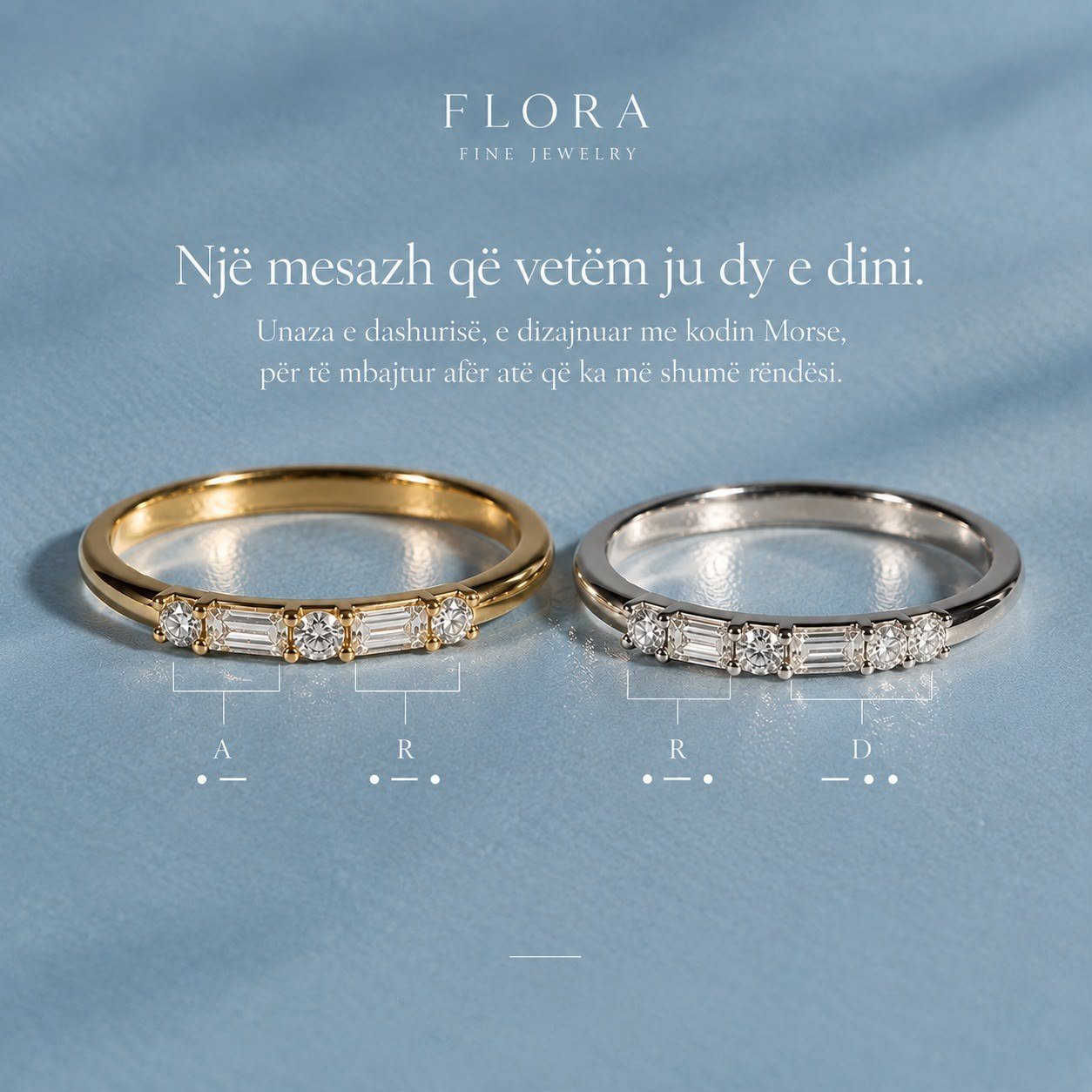 Two FLORA Morse code diamond bands in yellow and white gold, spelling initials in round and baguette diamonds
