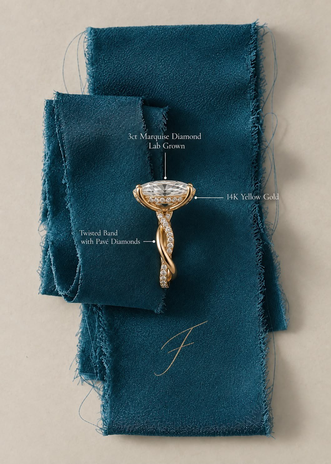The Marquise, a 3ct lab-grown marquise on a twisted pavé band, lying on teal silk ribbon